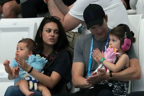 Mila Kunis and her husband Ashton Kutcher with their two kids
