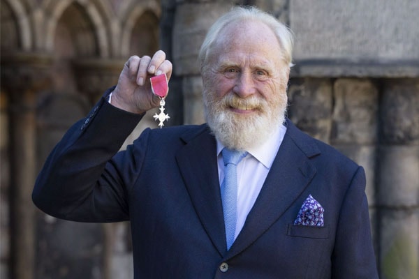 James Cosmo Received the batch from queen.