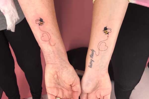 Molly Burke's matching tattoo with mom